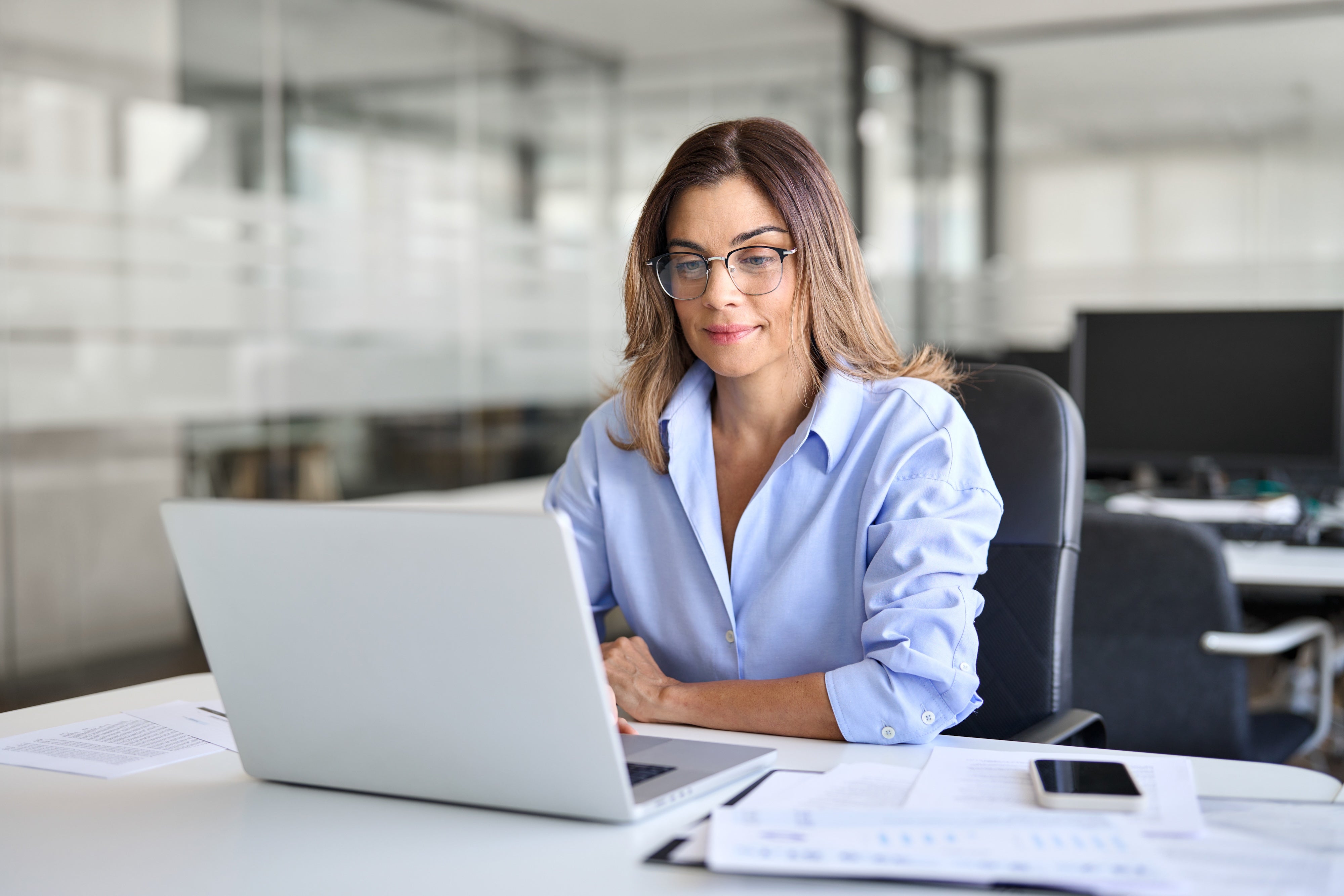 Woman_Working_at_Desk.jpg