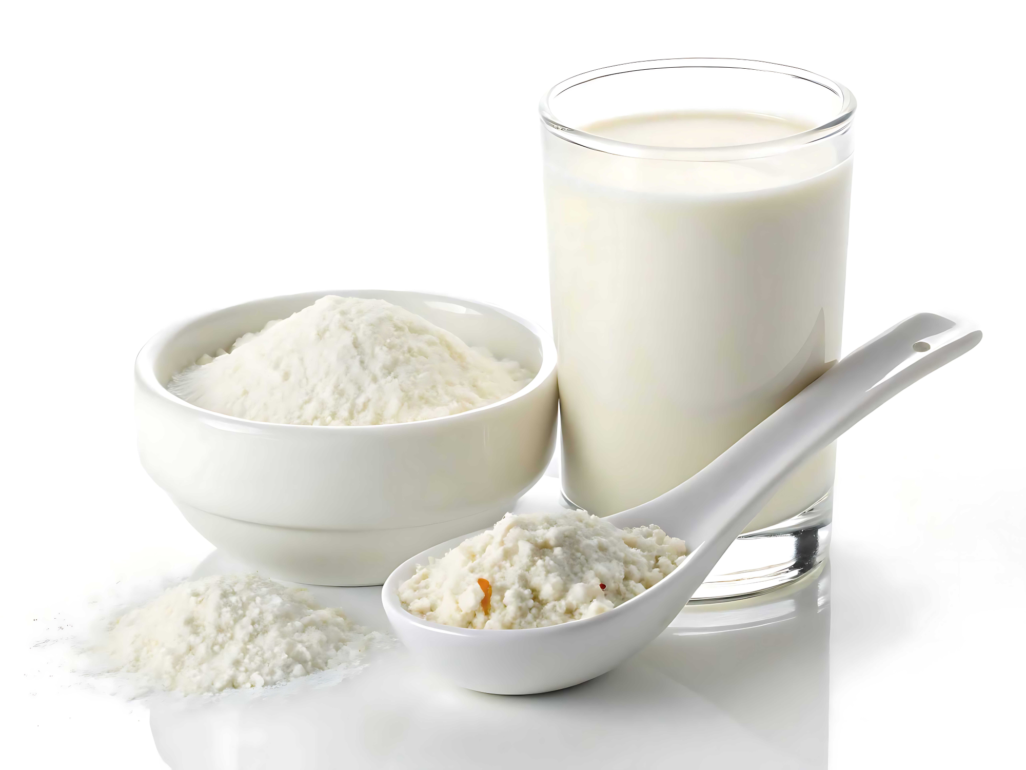 Glass of milk, bowl of flour, and spoonful of powder.